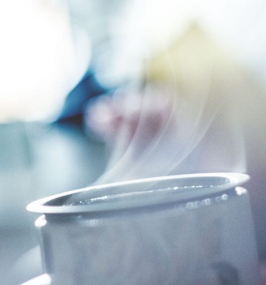 Wispy steam from a mug